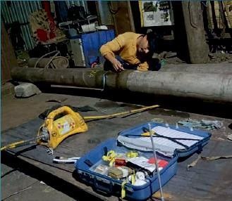 NDT testing Dolly on steel pipe in workshop